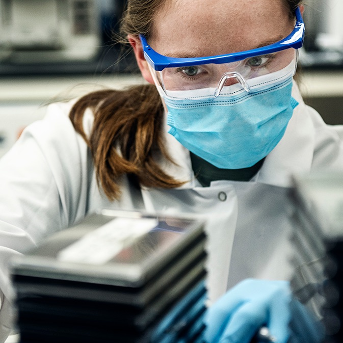 Scientist working on flu vaccine in Pfizer lab
